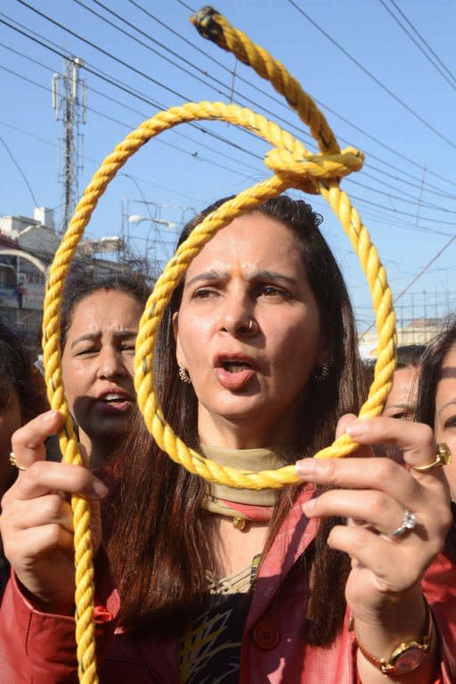 Indian politician Navjot Kaur Sidhu (centre) holds a noose as activists shout slogans during a demonstration in Amritsar on December 19, 2012. The rally was organised following the gang-rape of a student in New Delhi on December 16, which has sparked new calls for greater security for women across India