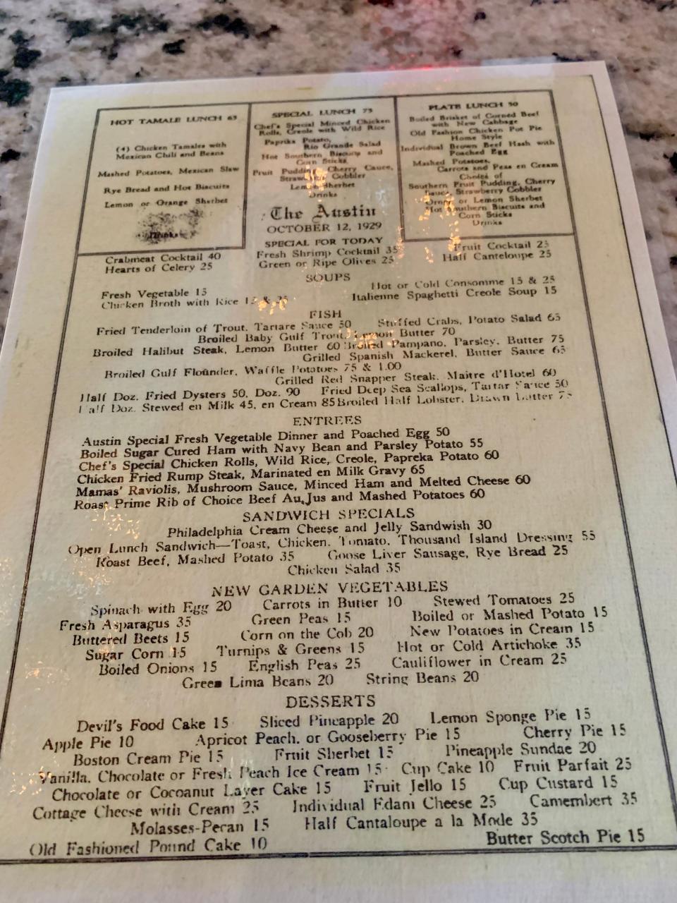 A reproduction of an October 12, 1929 menu for The Austin eatery at the Stephen F. Austin Hotel. Just over two weeks later on Oct. 28, known as "Black Monday," the Dow Jones Industrial Average declined nearly 13 percent, kicking off a market crash and the Great Depression.