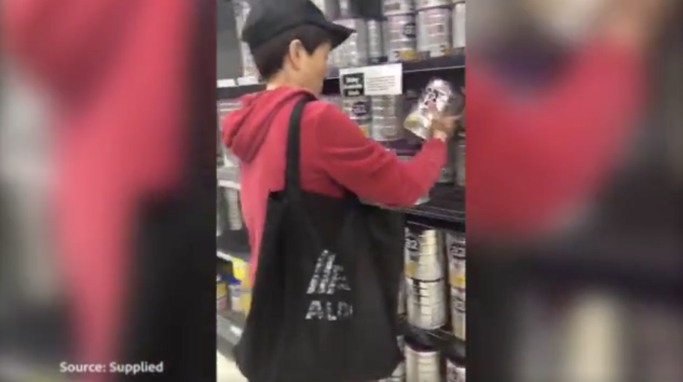 A woman who filmed the video claims customers would buy two tins before returning for more. Source: Supplied