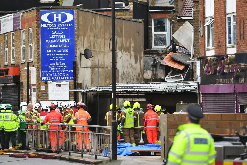 Emergency services at the scene of a  suspected gas explosion on King Street in Ealing, west London. (PA)