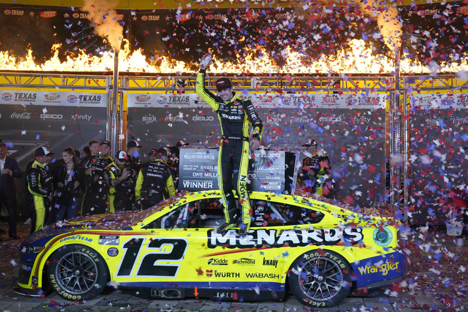 Ryan Blaney (12) celebrates in Victory Lane after winning the NASCAR All-Star auto race at Texas Motor Speedway in Fort Worth, Texas, Sunday, May 22, 2022. (AP Photo/LM Otero)