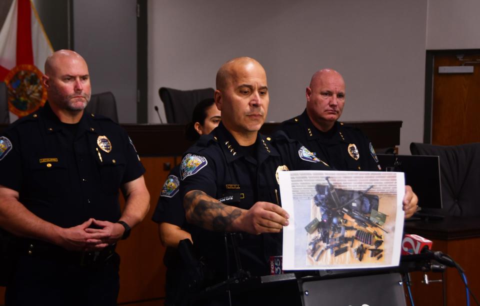 Palm Bay Police Chief Mariano Augello, at a Monday afternoon press conference, held up a photo of the weapons that Brandon Kapas had in his car.