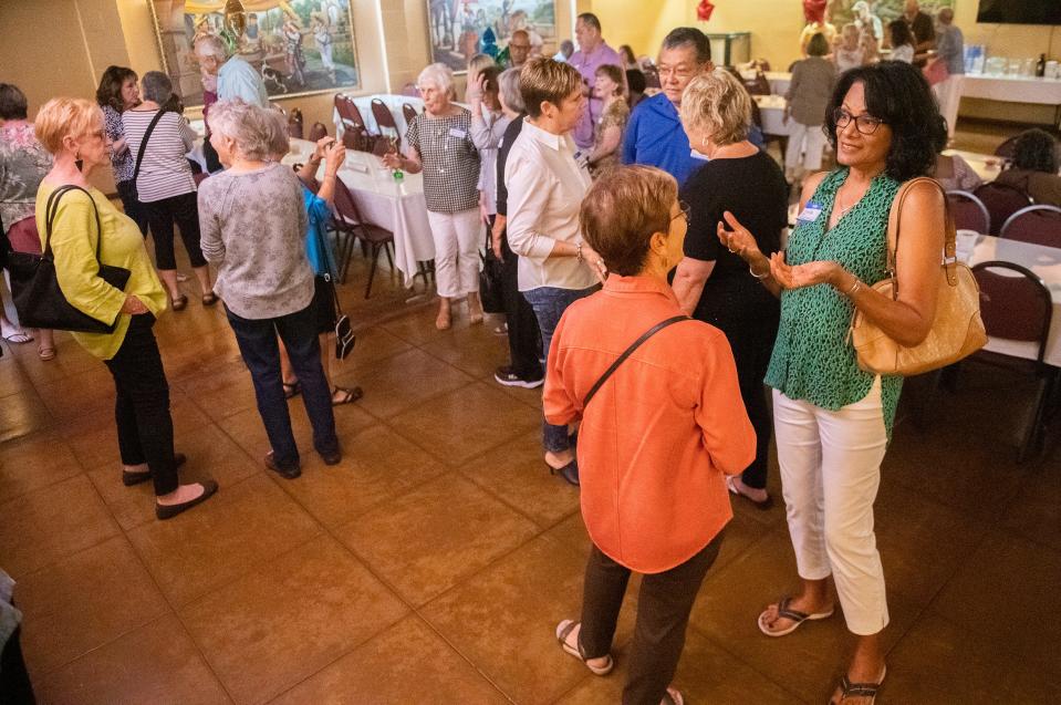 People attend the last reunion of former employees of the Stockton Developmental Center at the Cancun restaurant in downtown Stockton on Saturday, Oct. 8, 2022. 