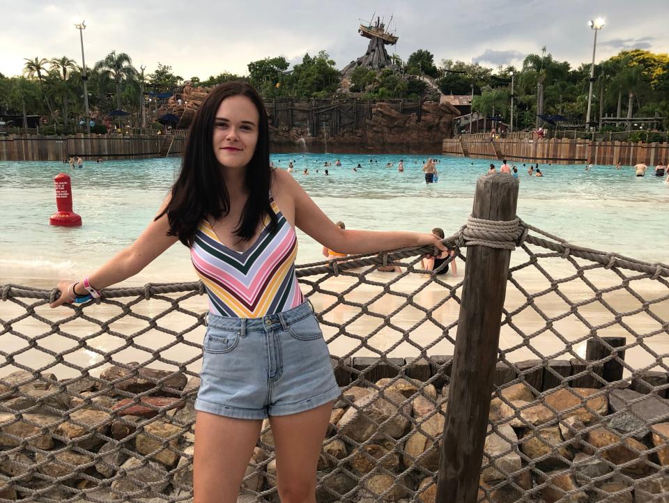 Samantha posing at typhoon lagoon waterpark in disney world