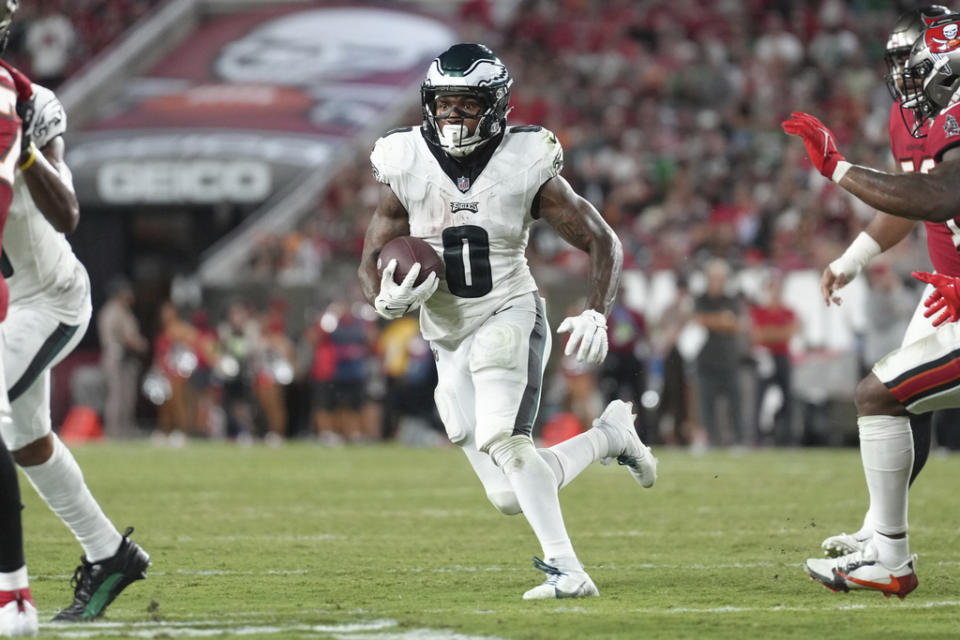 Philadelphia Eagles running back D’Andre Swift (0) eyes a defender as he rushes during an NFL football game against the Tampa Bay Buccaneers, Monday, Sept. 25, 2023, in Tampa, Fla. (AP Photo/Peter Joneleit)