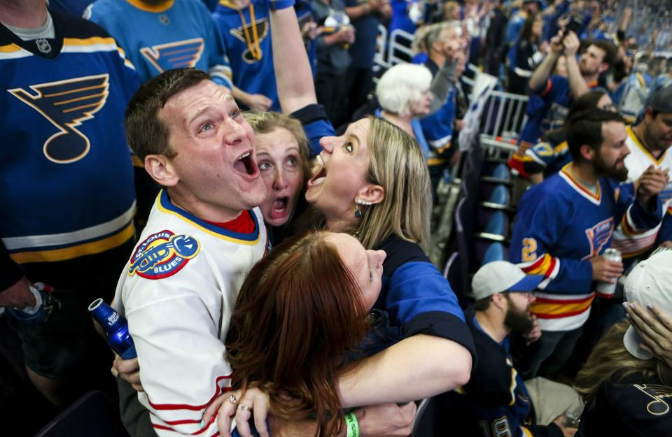 Bill Kess, left, and his friends react as the clock hits zero and the St. Louis Blues win the Stanley Cup over the Boston Bruins in Boston, during a watch party Wednesday, June 12, 2019, at Enterprise Center in St. Louis. (Colter Peterson/St. Louis Post-Dispatch via AP)
