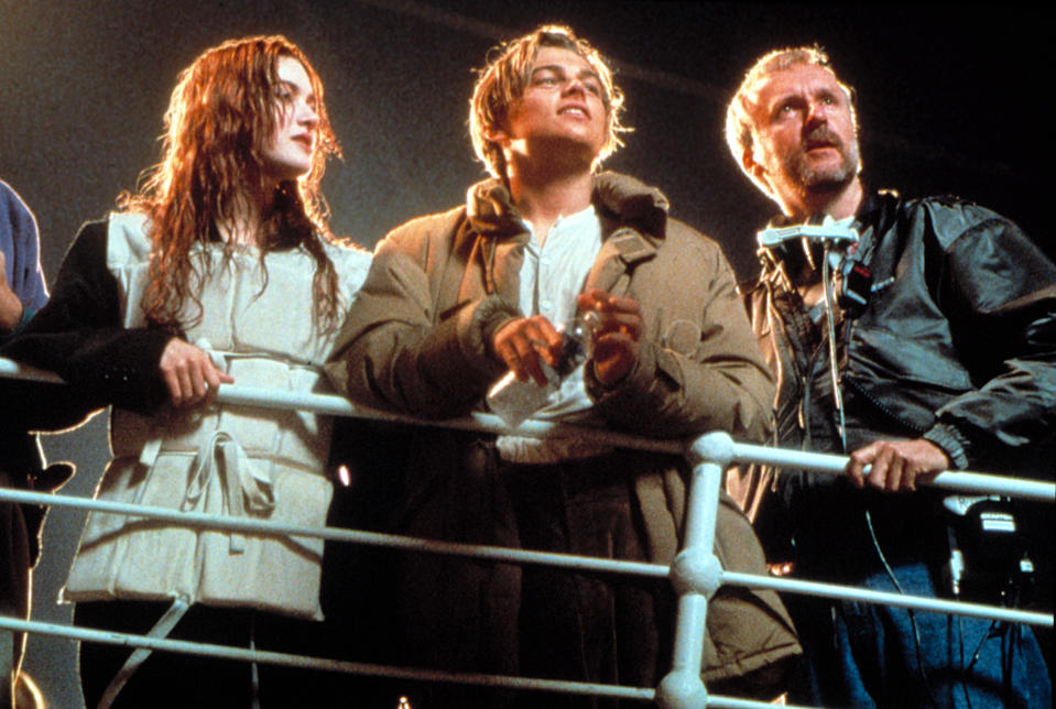 Kate Winslet, Leonardo DiCaprio. and James Cameron on the set of <em>Titanic</em>. (Photo: 20th Century Fox Film Corp)