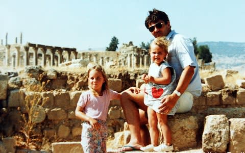 Kate Middleton, aged four , left, with her father and sister Pippa, in Jerash, Jordan - Credit: AP/Middleton family