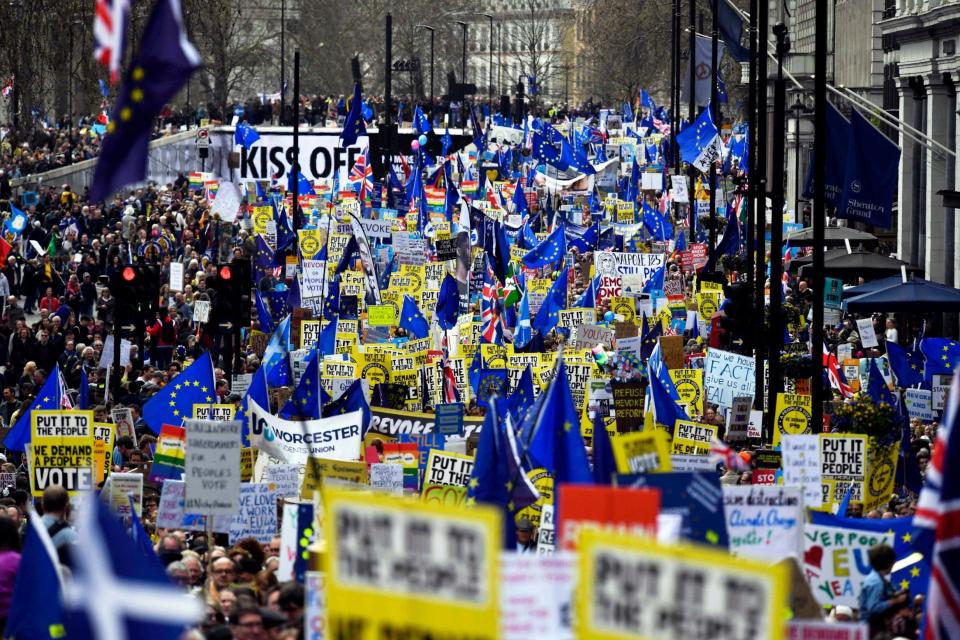 People attend the 'Put it to the People' march in London (EPA)