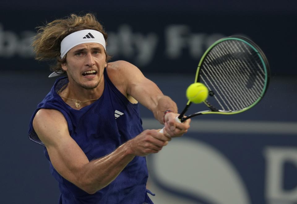 Germany's Alexander Zverev returns the ball to Andrey Rublev during their semi final match of the Dubai Duty Free Tennis Championships in Dubai, United Arab Emirates, Friday, March 3, 2023. (AP Photo/Kamran Jebreili)