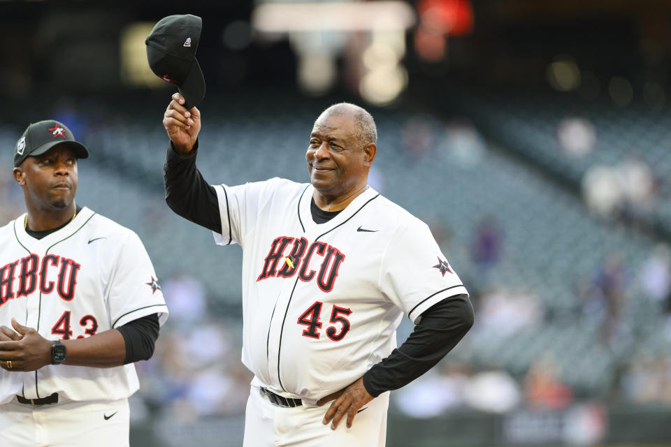 Former Major League Baseball player Ken Griffey Sr. (45) waves his cap to the crowd during introductions for the HBCU Swingman Classic baseball game during All-Star Week, Friday, July 7, 2023, in Seattle. (AP Photo/Caean Couto)