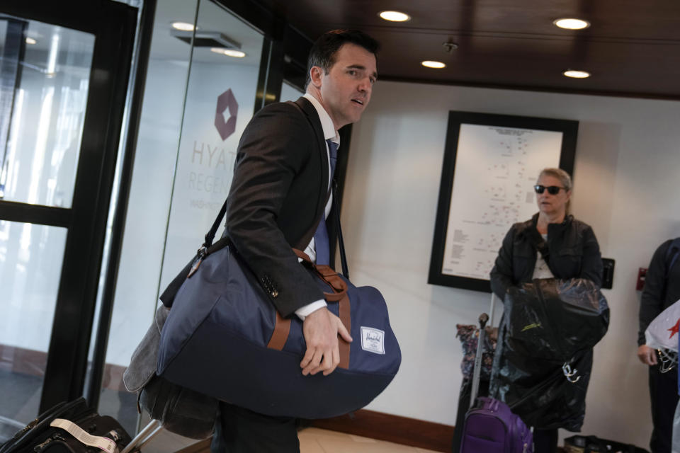 Rep.-elect Jeff Jackson, D-N.C., arrives for New Member Orientation check-in and program registration at the Hyatt Regency, in Washington, Sunday, Nov. 13, 2022. (AP Photo/Carolyn Kaster)