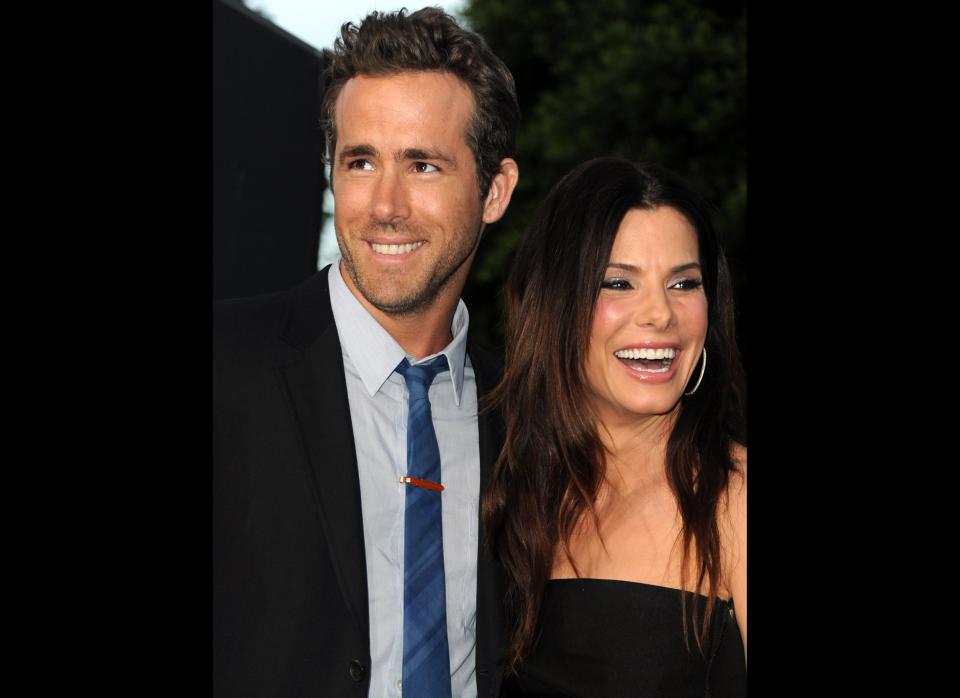 LOS ANGELES, CA - AUGUST 01:  Actors Ryan Reynolds (L) and Sandra Bullock arrive at the premiere of Universal Pictures' 'The Change-Up' held at the Regency Village Theatre on August 1, 2011 in Los Angeles, California.  (Photo by Kevin Winter/Getty Images)
