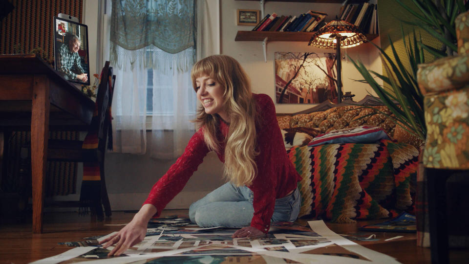 A young woman has a video chat on a Portal smart screen.