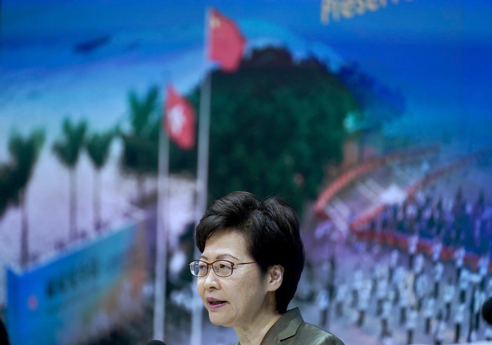 Hong Kong Chief Executive Carrie Lam speaks during a press conference in Hong Kong, Tuesday, April 13, 2021. Lam said Tuesday that Hong Kong's legislative elections would take place in December, more than a year after they were postponed last year with authorities citing public health risks from the coronavirus pandemic. (AP Photo/Vincent Yu)