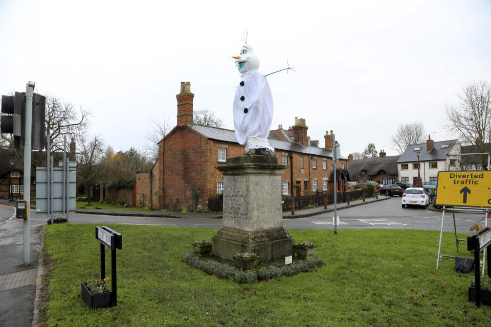 A village is hunting festive pranksters who have turned a statue of its most famous son into PEPPA PIG. The statue of Lord John Scott, who died in 1860, is a Christmas target for jokers in Dunchurch, near Rugby, Warks. Hilarious pictures show the monument draped in a pink sheet with arms stretched out and a huge pink papier mache head resembling kids' TV favourite. The statue has previously been turned into Harry Potter, Shrek, Happy Feet, Pikachu, Homer Simpson, an Olympic athlete and The Grinch in an annual tradition dating back to the 1970s.