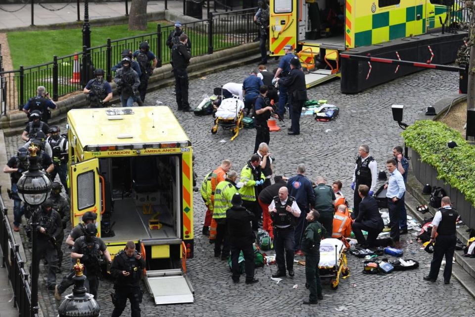 The scene outside the Palace of Westminster, London, where Pc Keith Palmer was fatally stabbed by Khalid Masood after he ploughed into pedestrians on Westminster Bridge. (PA)