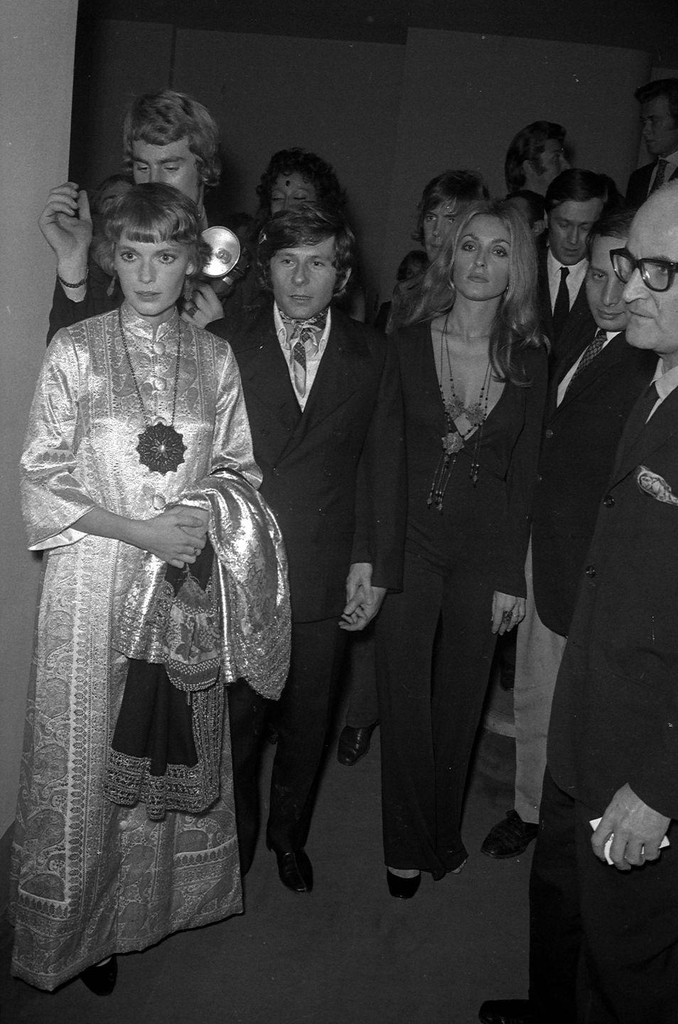 <p>Farrow poses with director Roman Polanski and his wife, actress Sharon Tate, at the premiere of <em>Rosemary's Baby</em> at the Cannes Film Festival. Polanski had originally envisioned Tate in the role of Rosemary Woodhouse<em>, </em>but Paramount decided to cast Farrow instead. </p>