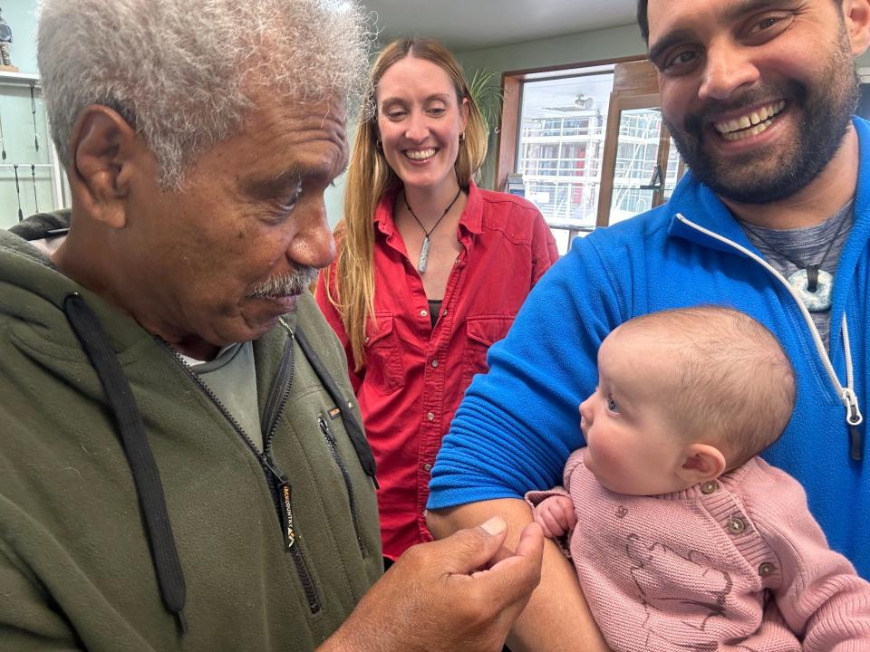 Ash, Dre and Lyra with shop owner Steve Gwaliasi