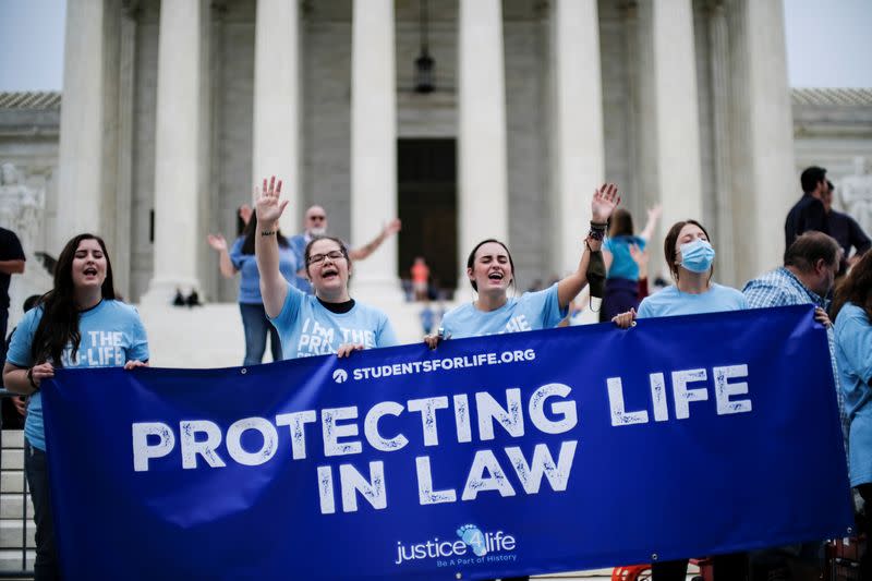 Protestors demonstrate outside the U.S. Supreme Court after U.S President Donald Trump announced U.S. Court of Appeals Judge Amy Coney Barrett as his nominee to fill the Supreme Court seat left vacant by the death of Justice Ruth Bader Ginsburg