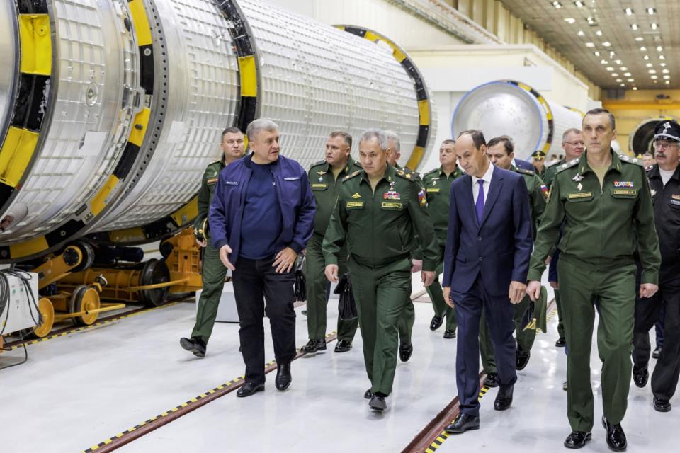 FILE - In this photo released by Russian Defense Ministry Press Service on Saturday, Oct. 7, 2023, Russian Defense Minister Sergei Shoigu, center, inspects fulfilment of the state defense order at the Krasnoyarsk Machine-Building Plant defense industry enterprise in Krasnoyarsk region of Russia. President Vladimir Putin is likely to win another six-year term easily in an election expected in March, using his sweeping grip on Russia’s political scene to extend his tenure of over two decades in power. But he faces daunting challenges. (Russian Defense Ministry Press Service via AP, File)