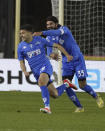 Empoli's Nicolo Cambiaghi, left, celebrates scoring during the Italian Serie A soccer match between Empoli and Torino at the Empoli Stadium in Empoli, Italy, Saturday, April 6, 2024. (Marco Bucco/LaPresse via AP)