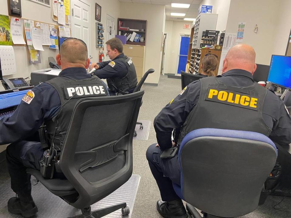 Shiloh police officers are seen here working in a crowded space. Funding a new station took a step forward when Mayor Robert Weilmuenster broke a 3-3 tie at the Shiloh Village Board meeting Monday. The approved resolution committed $1.2 million of the capital projects fund balance for the construction of a police station.