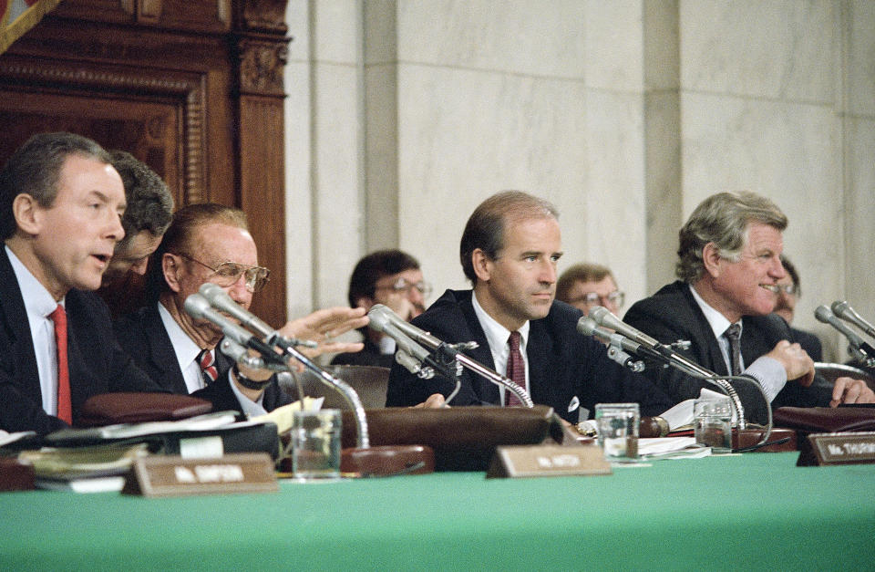 FILE - Senate Judiciary Committee Chairman Joseph Biden, D-Del., left, and Sen. Edward Kennedy, D-Mass., right, listen during witness confirmation hearings for Supreme Court nominee Robert H. Bork, Sept. 21, 1987 in Washington, at far left is Sen. Orrin Hatch, R-Utah, and Sen. Strom Thurmond, R-S.C. During the hearing Biden focused his questioning on Griswold v. Connecticut, a 1965 decision that allowed married couples to buy birth control. “If we tried to make this a referendum on abortion rights, for example, we’d lose," he wrote in his 2007 memoir, “Promises to Keep.” (AP Photo/John Duricka, File)