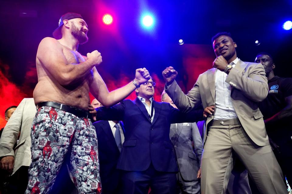 Tyson Fury, left, and Francis Ngannou face off in London (James Manning/PA) (PA Wire)