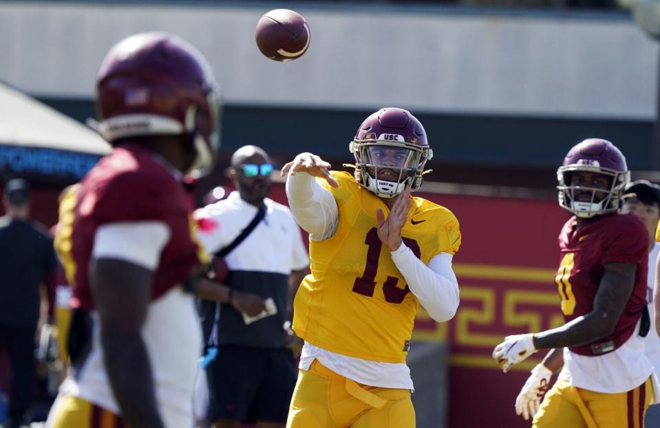 USC quarterback Caleb Williams (13) throws during NCAA college football practice