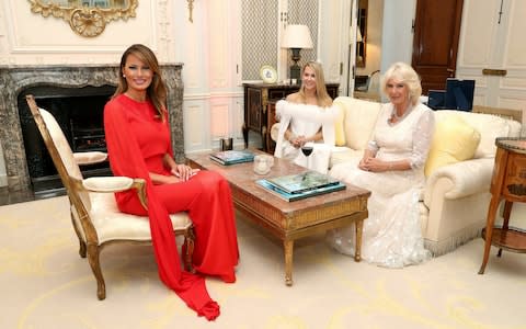 US first lady Melania Trump, left, Suzanne Ircha, wife of the US Ambassador to the UK, Woody Johnson and Camilla, the Duchess of Cornwall  - Credit: Chris Jackson/Pool Photo via AP