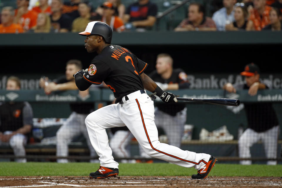 Baltimore Orioles' Cedric Mullins doubles in the second inning of a baseball game against the Boston Red Sox, Friday, Aug. 10, 2018, in Baltimore. Renato Nunez scored on the play. (AP Photo/Patrick Semansky)