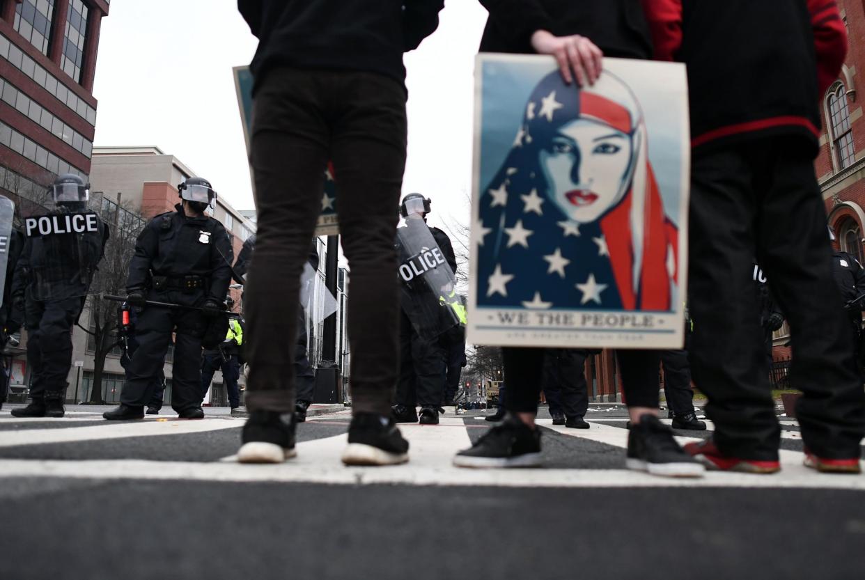 Protestors face off with police in Washington, DC on the day of Donald Trump's election: JEWEL SAMAD/AFP/Getty Images