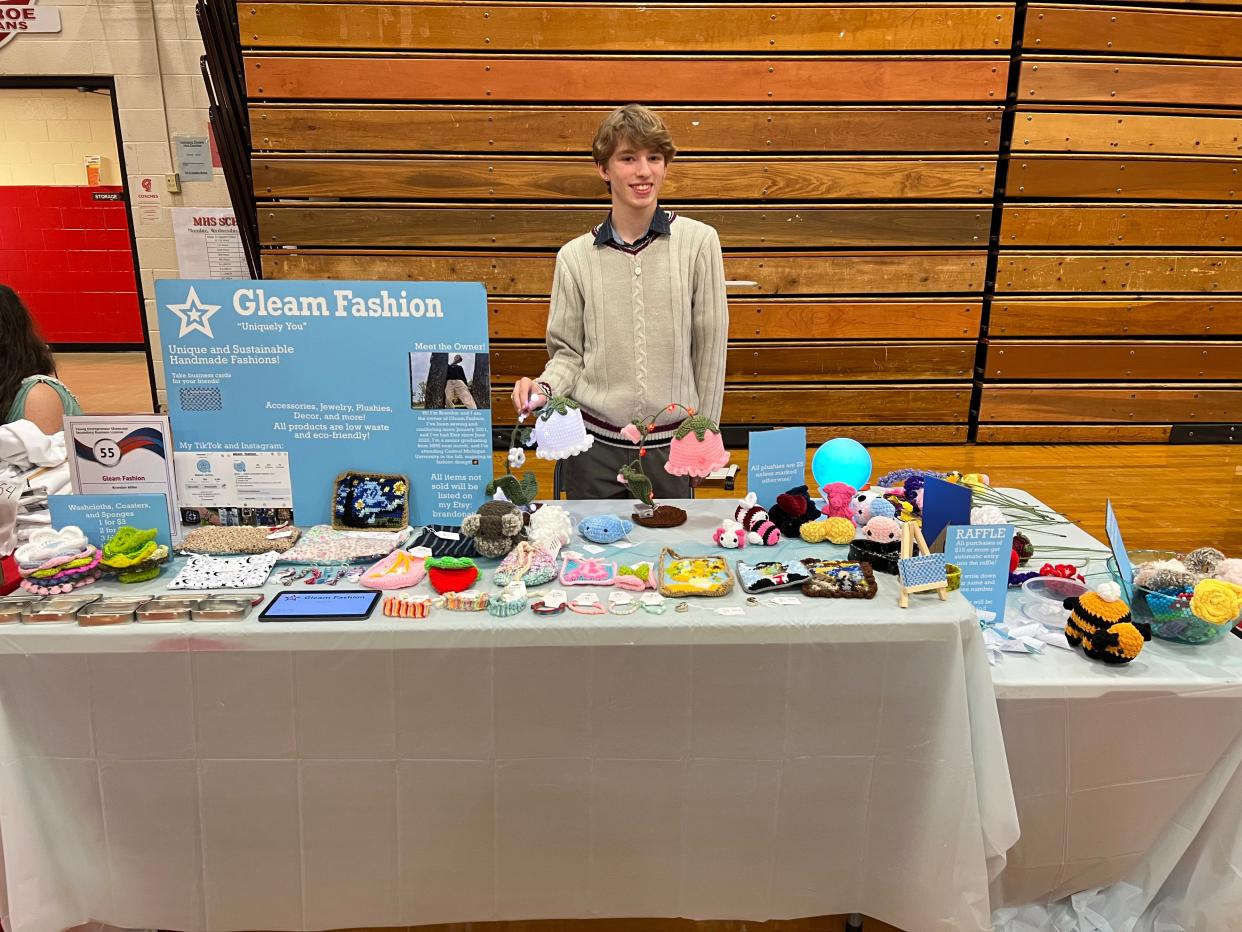 Brandon Miller is shown selling crocheted items at Monroe Public Schools’ recent Young Entrepreneur Showcase.
