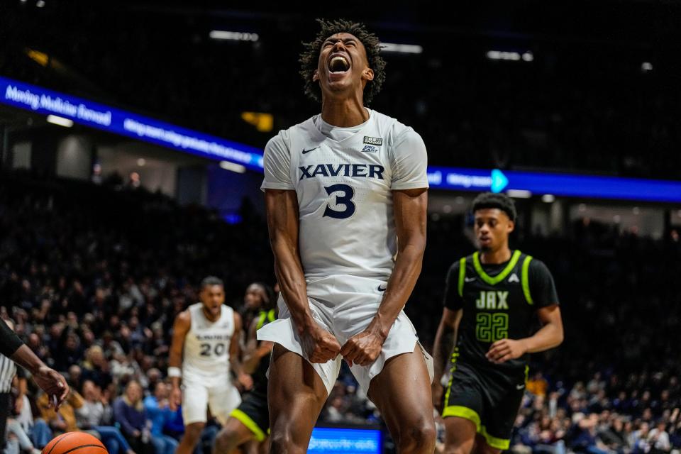 Xavier guard Dailyn Swain (3) celebrates a dunk against Jacksonville. Swain is coming off back-to-back double-digit scoring efforts, going 8-for-14 for 25 points.