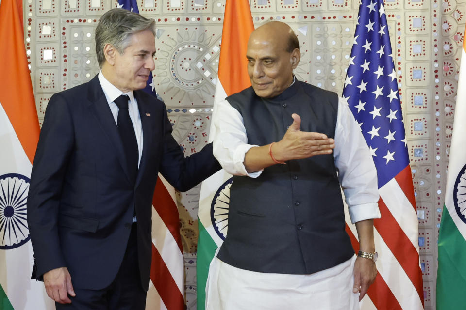 India's Defense Minister Rajnath Singh escorts U.S. Secretary of State Antony Blinken as they leave after a group photo as part of the so-called "2+2 Dialogue" at the foreign ministry in New Delhi, India, Friday, Nov. 10, 2023. (Jonathan Ernst/Pool Photo via AP)