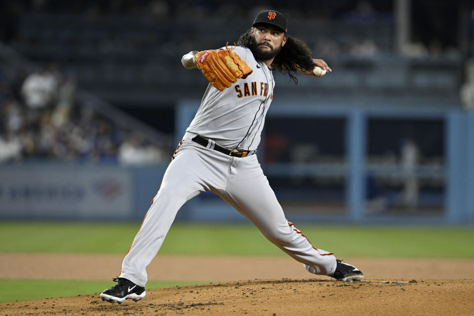 San Francisco Giants starting pitcher Sean Manaea throws to a Los Angeles Dodgers batter during the first inning of a baseball game in Los Angeles, Friday, Sept. 22, 2023. (AP Photo/Alex Gallardo)