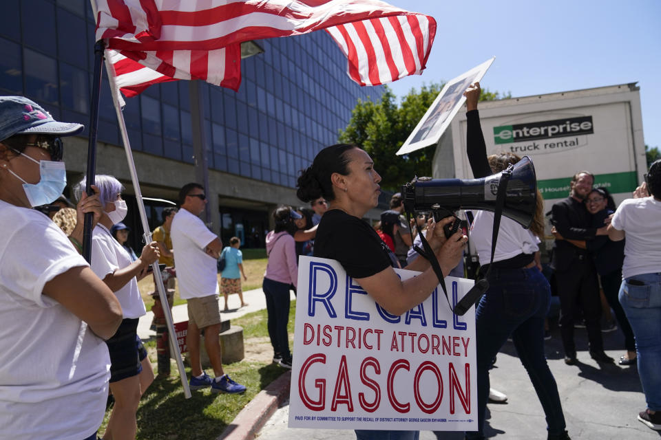 Supporters of a campaign to recall Los Angeles County District Attorney George Gascon gather to view a truck full of petitions outside the Los Angeles County Registrar of Voters on Wednesday, July 6, 2022, in Norwalk, Calif. (AP Photo/Ashley Landis)