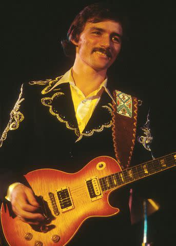 <p>Jeffrey Mayer/Getty</p> Dickey Betts live in concert with the Allman Brothers Band in Los Angeles on August 20, 1973.