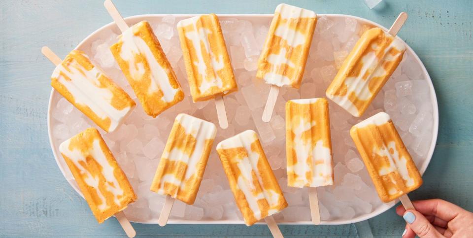 frozen creamsicle bars with orange and cream swirls