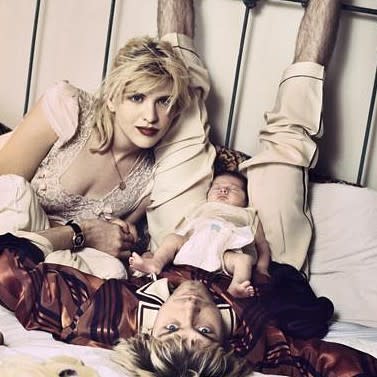 <strong>Courtney Love</strong> is still seeking answers more than 20 years after <strong>Kurt Cobain </strong>committed suicide at age 27. In a series of heartbreaking messages posted to her Facebook and Instagram, the 51-year-old rocker shared bedroom photos of her, Cobain and their newborn daughter <strong>Frances Bean.</strong> <strong>WATCH: Frances Bean Cobain Opens Up About Kurt's Death for the First Time</strong> “Makes me feel so sad. Our baby is all grown up now,” Love captioned one of the family photos posted to her social media accounts. “Jesus Kurt look at her face, what on earth were you thinking..!?!?” “God I miss you, we all miss you,” she continued, ending the note with the hashtags “#family #memories #turnbacktime #lovehim.” <strong>NEWS: 7 Things We Learned About Kurt Cobain' From 'Montage of Heck'</strong> In another photo, the Nirvana frontman is seen lying down on the bed with his feet propped up against the bedframe, with little Frances Bean in between his legs and Love resting her head against him. “My greatest love and our precious Bean,” she captioned that pic, using the hashtags “#missyou #memories” to articulate her mood. <strong>NEWS: 'Montage of Heck' Director Brett Morgen on his Favorite Nirvana Song & How Ken Burns Helped Prep Him</strong> Earlier this year Cobain was the subject of a critically-hailed HBO documentary, <em>Kurt Cobain: Montage of Heck</em>, which used previously unseen home footage, journals and recordings to paint a portrait of the late singer. At the film’s Tribeca Film Festival premiere in April, Love admitted to feeling “some shame” while watching it – at the time, it was her fourth time viewing it. “Mostly I get really sad. There’s guilt, about what I could have done,” she said back then. “I told myself I wouldn’t see it again, but I did. Self-punishment I guess.” She also opened up about the effect Cobain had on her, saying, “We were best friends.” “I’ve had great boyfriends since, but I’ll never have another friend like that,” she admitted. “It’s that punch-drunk love, where you meet your soulmate and you’re 26 and f**king and talking and fighting and f**king. There are other kinds of love, more mature love. But this was a soulmate thing.” Love and her daughter, who turned 23 years old on Aug. 18, served as executive producers on the doc.