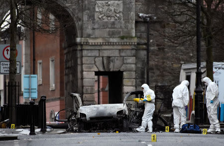 Forensic officers arrive at the scene of a suspected car bomb in Londonderry, Northern Ireland January 20, 2019. REUTERS/Clodagh Kilcoyne