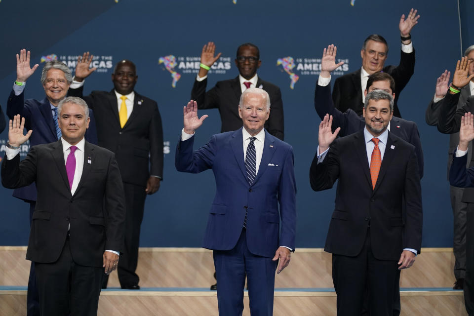 President Joe Biden, center participates in a family photo beside Colombian President Ivan Duque, left, and Paraguay President Mario Abdo Benitez and other heads of delegations at the Summit of the Americas, Friday, June 10, 2022, in Los Angeles. (AP Photo/Evan Vucci)