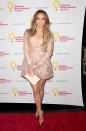 <p>The “American Idol” host looked angelic in a nude silk organza cocktail dress at a charity event in Los Angeles.<br><br></p>