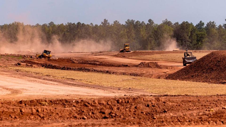 Heavy equipment prepares the site for a new VinFast production facility Friday, July 28, 2023 in Moncure.