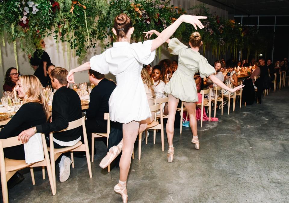 An atmosphere photo of ballet dancers performing at the Saks x Jonathan Simkhai dinner party held on Dec. 16, 2021 in Los Angeles, California. - Credit: Images courtesy of BFA/Linnea Stephan