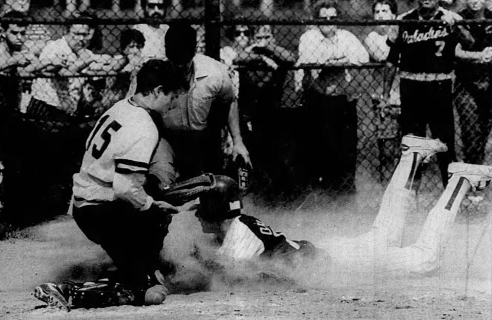 Pete Ohnegian slides home safely with Ramsey's third run in its 14-3 Bergen baseball tournament title game win. CARMINE GALASSO/THE RECORD -- Originally published in Monday, June 5, 1989 edition of The Record, page D-7.