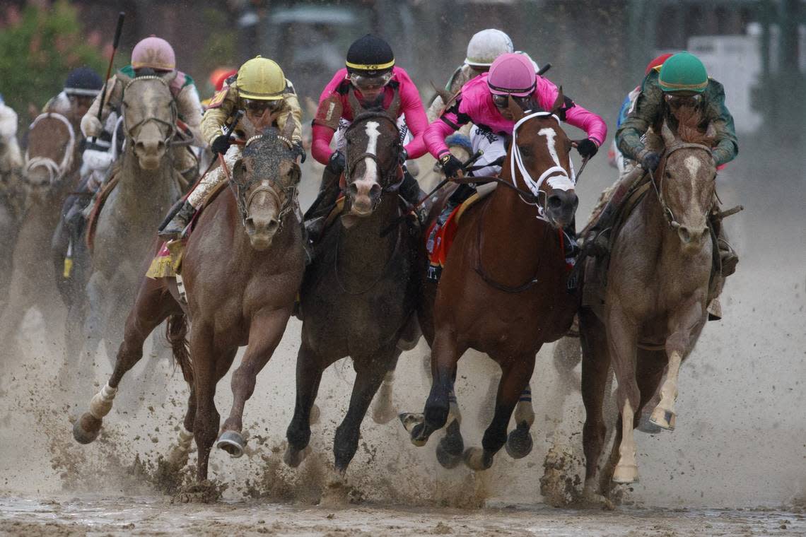 Country House, left, War of Will and Maximum Security bumped alongside Code of Honor, right, as the field headed into the homestretch of the 145th Kentucky Derby at Churchill Downs in 2019. Maximum Security crossed the finish line first but was disqualified by race stewards, making Country House the official winner. The incident was one of many recent black eyes for the sport.