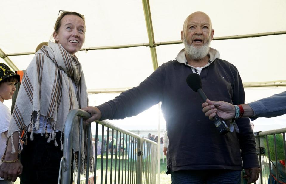 Glastonbury organisers Michael and Emily Eavis greeted ticket-holders as the gates opened for last year’s festival (Yui Mok/PA) (PA Wire)