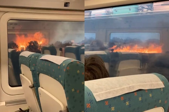 西班牙一輛列車18日行經北部的薩莫拉省時，一度被野火包圍，乘客議論紛紛。（圖／翻攝自推特）
